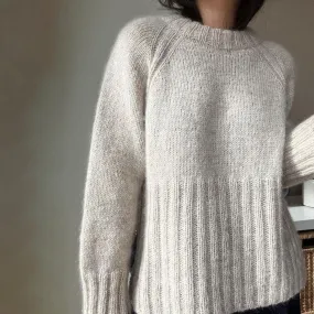 Pull à manches longues simple et moderne
