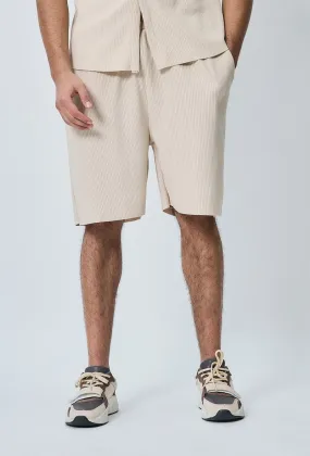 Short plissé oversize